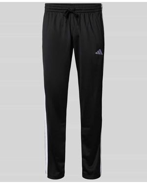 adidas Straight Leg Trainingshose mit Logo-Stitching - Schwarz