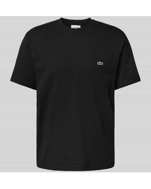Lacoste T-Shirt mit Brusttasche - Schwarz
