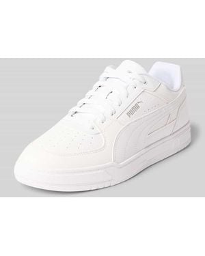 PUMA Sneaker mit Label-Prägung Modell 'Caven III' - Weiß