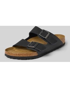Birkenstock Slides aus Leder mit Dornschließe Modell 'Arizona' - Schwarz