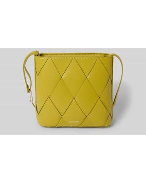 Calvin Klein Handtasche in Flecht-Optik - Gelb