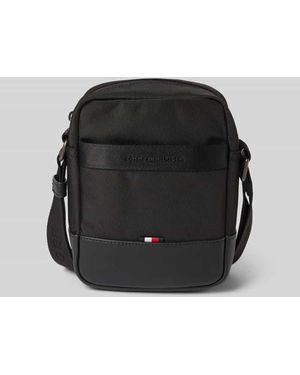 Tommy Hilfiger Umhängetasche mit Label-Schriftzug aus Metall - Schwarz