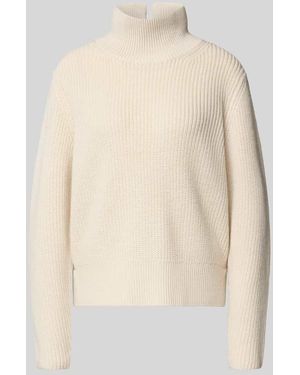 Windsor. Strickpullover mit geripptem Stehkragen - Natur