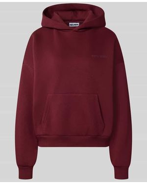 Review Relaxed Fit Hoodie aus Baumwoll-Mix mit Label-Detail - Rot
