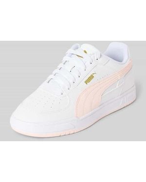 PUMA Sneaker mit dämpfender Gummisohle Modell 'Caven III' - Weiß