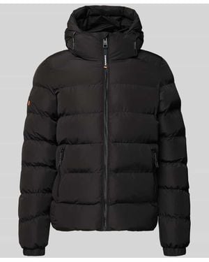 Superdry Steppjacke mit Kapuze und seitlichen Reißverschlusstaschen - Schwarz