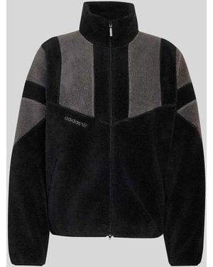 adidas Originals Loose Fit Sweatjacke mit weichem Fleece-Innenfutter - Schwarz