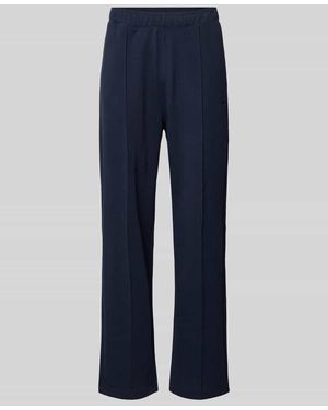 Champion Sweatpants mit Längsnähten und Label-Stitching - Blau