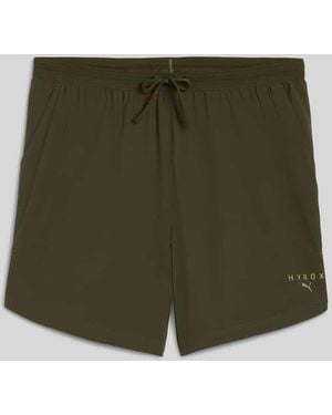PUMA PUMA x HYROX - Regular Fit Sport-Shorts aus ultraleichtem Material - Grün