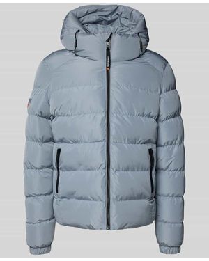 Superdry Steppjacke mit Kapuze und seitlichen Reißverschlusstaschen - Blau