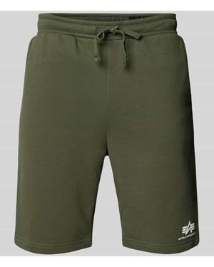 Alpha Industries Sweatshorts mit elastischem Bund und Tunnelzug - Grün