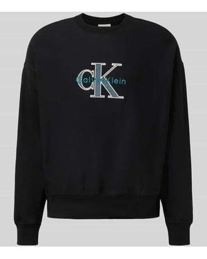 Calvin Klein Oversized Fit Sweatshirt mit Logo-Stitching Modell 'Premium' - Schwarz