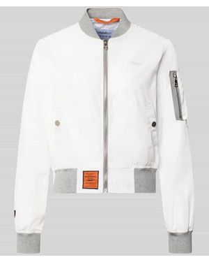 ORIGINAL BOMBERS® Bomberjacke mit Label-Patch und Reißverschlusstasche am Ärmel - Weiß