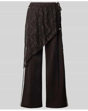 adidas Originals Loose Fit Sweathose aus Baumwoll-Mix Modell '2IN1 LACE FIREBIRD' - Schwarz