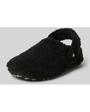 Crocs™ Hausschuhe aus Teddyfell - Schwarz