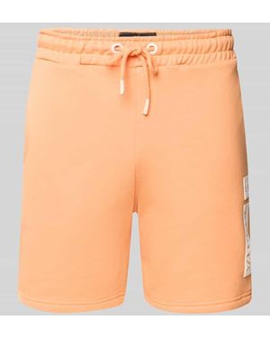 Alpha Industries Sweatshorts mit elastischem Bund und Tunnelzug - Orange
