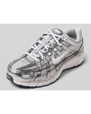 Nike Sneaker mit Label-Patch - Mettallic