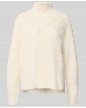 Windsor. Strickpullover aus Schurwolle mit Stehkragen - Natur