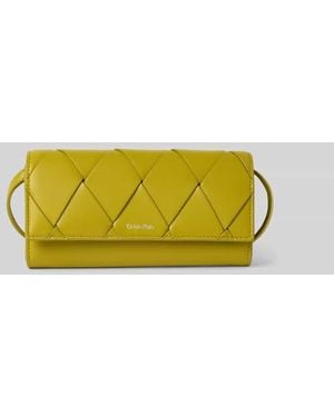 Calvin Klein Handtasche in Flecht-Optik - Gelb