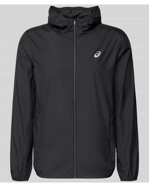 Asics Windbreaker mit Logo-Print und Kapuze - Schwarz