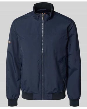 Superdry Jacke mit Stehkragen und Eingrifftaschen - Blau