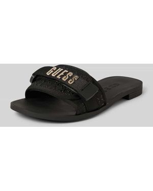 Guess Slides mit Label-Applikation Modell 'ELYZE' - Schwarz