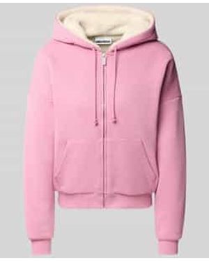 Review Sweatvesten - Roze