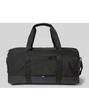 Tommy Hilfiger Weekender mit Label-Schriftzug aus Metall - Schwarz