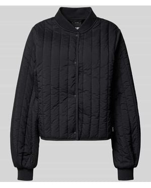Rains Steppjacke mit Knopfverschluss Modell 'Banja Liner' - Schwarz