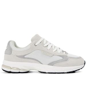 Unseen Train Run Trainers - White