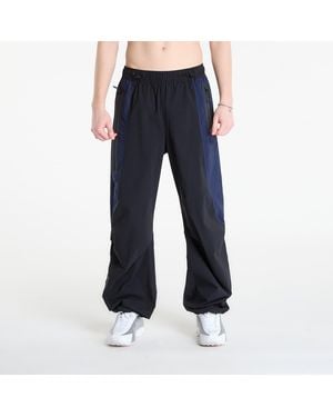 Nike Hosen Tech Dri-Fit Woven Color-Block Pants/ Obsidian - Blau