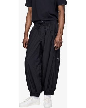 Y-3 Jogginghosen Raw Edge 3 Stripes Nylon Shell Tracksuit Bottoms - Schwarz