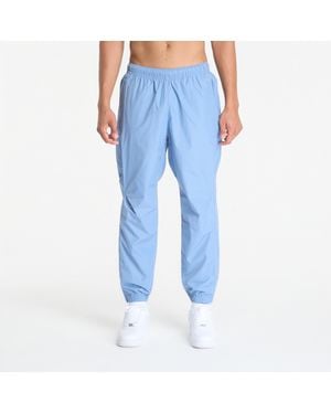 Nike Pantaloni X Nocta Northstar Nylon Track Pants Work/ Polar - Blu
