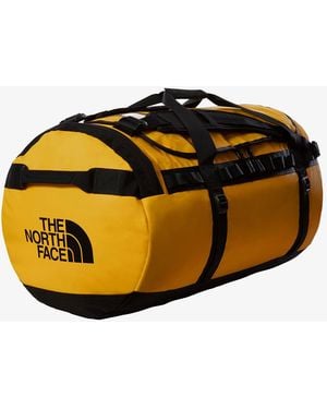 The North Face Base camp duffel - l summit gold/ tnf black 95 l - Orange