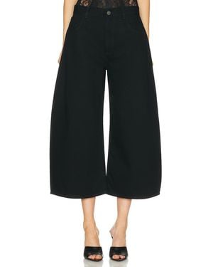 The Attico Curved Short Leg - Black