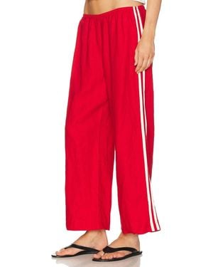 DONNI. The Linen Crop Racer Stripe Pant - Red