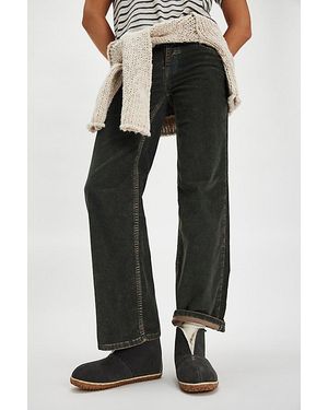 Minnetonka Tucson Slippers At Free People In Charcoal, Size: Us 6 - Multicolour