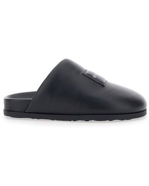 Givenchy Mules With Asymmetrical Design And Padded Leather Logo - Black