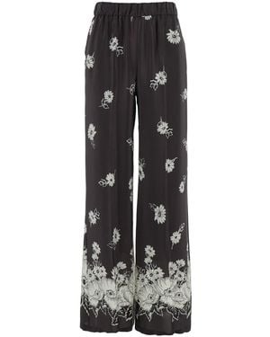 P.A.R.O.S.H. Pants With Elastic Waist And All-Over Floral Motif - Black