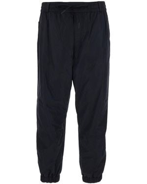 Moncler Jogger Pants With Logo Patch On The Back - Blue