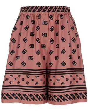 Dolce & Gabbana Bermuda Con Logo Dg Stampato All-Over - Rosso