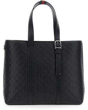 Gucci 'Emblem' Tote Bag With All-Over Embossed Gg Motif - Black