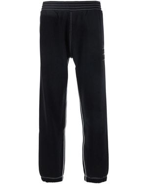 Givenchy Jogger Trousers With 4G Embroidery - Black