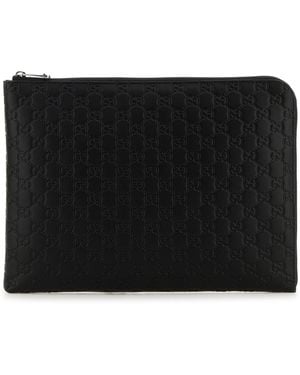 Gucci Clutch GG Emblem in pelle nera - Nero