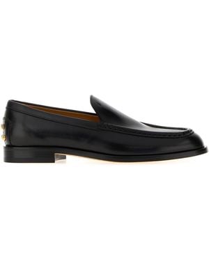 Tod's Black Leather Loafers