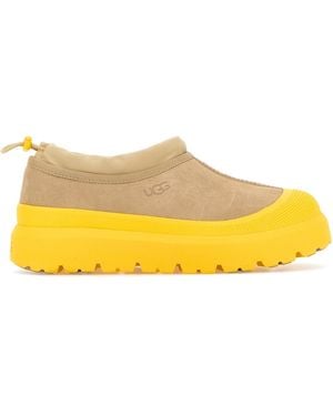 UGG Slip on Tasman Weather Hybrid in pelle scamosciata e gomma sabbia - Giallo