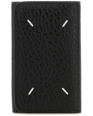 Maison Margiela Astuccio portachiavi Four Stitches in pelle nero