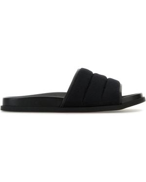 Gucci Slippers in tessuto GG nero