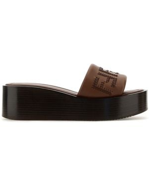 Fendi Slippers Sunshine in pelle marrone - Nero