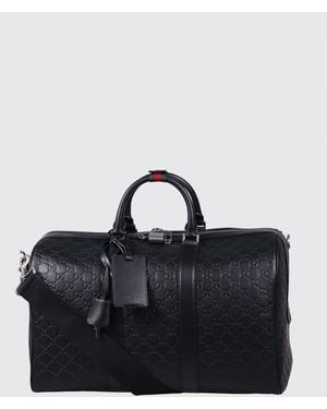 Gucci Gg Emblem Leather Duffle Bag With Embossed Gg Monogram - Black